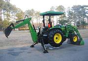 $3, 400 US = 2OO4 John Deere 4710 TLB 4WD All Attachments Free Delivery